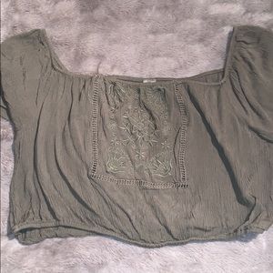 Green off the shoulder shirt